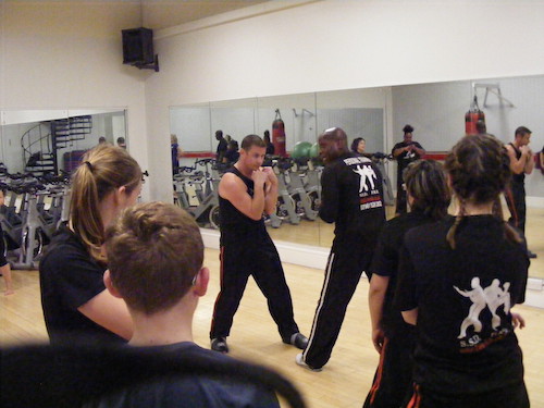 A student gats instruction from Rob at Richmond Olympus Gym