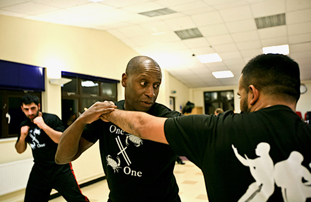 Rob shows a student kickboxing technique at the Isleworth Studio